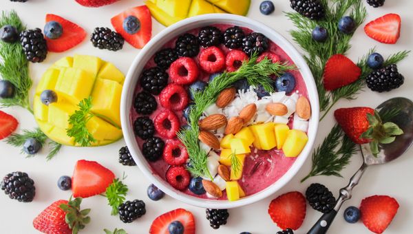 Plain Greek yogurt bowl with berries — probiotics and protein naturally boost GLP-1 levels