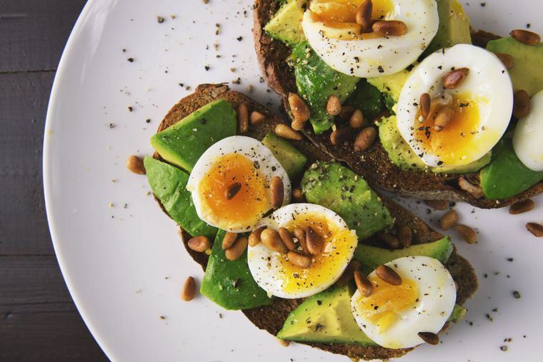 Fresh eggs in a carton — one of the best and most affordable metabolism-boosting breakfast foods